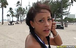 Sexy latina Richie DeVille does exercises on the beach
