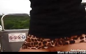 German girl exposing to strangers on ferris wheel