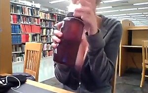 Sandy shows off her tits in public library