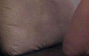 Blonde teenie masturbating on her couch in webcam