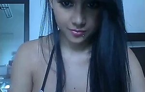 Sexy black haired babe teasing on webcam