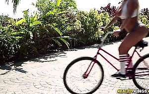 Brandi bae rides the vibrator on her bicycle outdoors