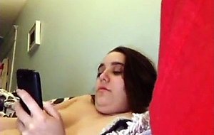 Horny chubby chick masturbates in bed