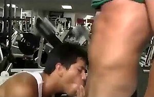 Hunk deepthroats my cock at the gym