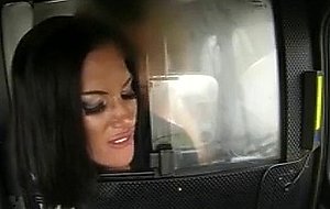 Busty tanned milf fucked in fake taxi from behind
