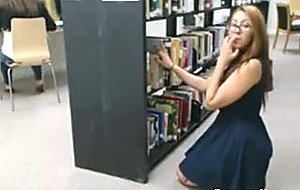 Naked camgirl in public library