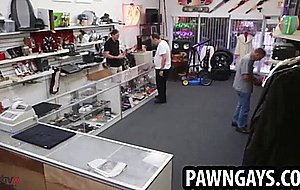 Horny hunk tugging on his cock at the pawn shop