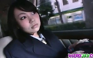 Japanese girl fucks in a car