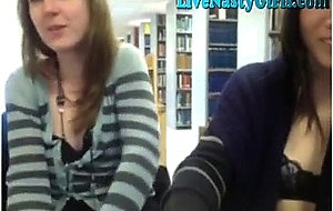 Cam girls get nude in public library