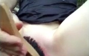 Alone in woods, use brush to spank and fuck my pussy until i