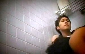 Hidden cam catches asian twinks bathroom sex