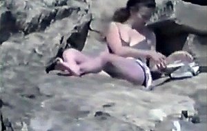Fingering pussy at beach 