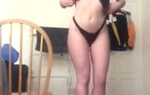 Sexy brunette stripping  