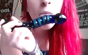 Redhead emo girl and her toys