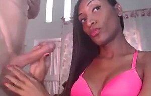 Delicious chocolate shemale stroking her bf's cock  