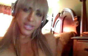 Big-lipped blonde with tremendous tits jerks her dick on cam