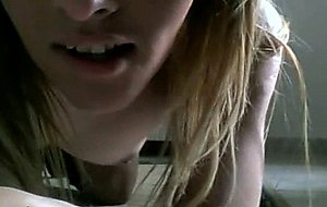Slim blonde girl plays with a big vibrator