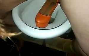 Piss in orange heels  