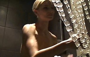 Cute babe with big boobs has a shower