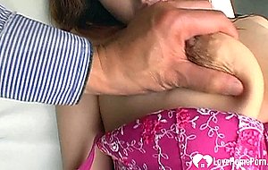 Brunette japanese girl gets her huge tits covered