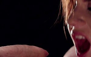 Suspended redhead gets mouth banged