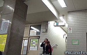 Sexy asian pissing in public  