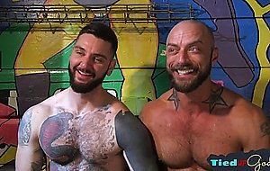 Suspended stud sub throatfucked by inked hunk  