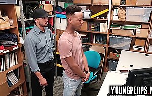 The officer caught the young black perp  