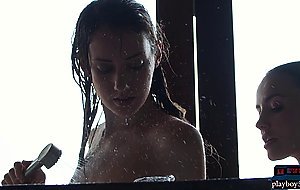 Two skinny brunette MILF models sensually shower together