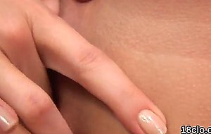 Cute teenie is spreading spread cunt in close-up a  