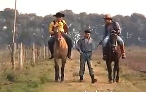 Cute Argentinean gaucho gets down on his knees to take ...