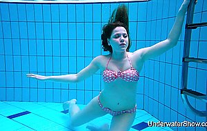 Sexy girl shows magnificent young body underwater