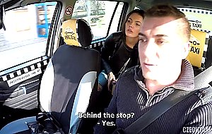 Brunette fucked in a taxi