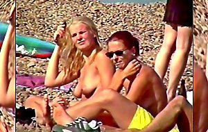 Girls Topless at the Beach 