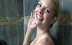 Gorgeoud blonde teen playing in the shower