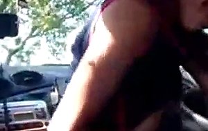Brunette slut sucks cock in a car 