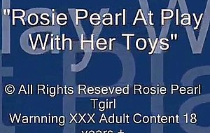 Rosie pearl at play with her toys