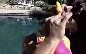 Busty tranny for mad interracial orgy by a pool