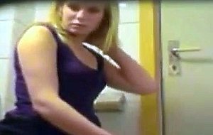 Blonde amateur teen caught using the toilet