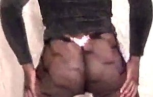Chubby crossdresser teasing in pantyhose