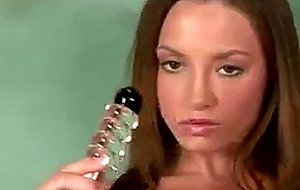 Hot brunette fucks her pussy with a vibrator