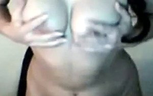 Nice girl on webcam strips and teases