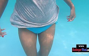 Amateur teen couple having fun in a public pool and enjoy hot sex after