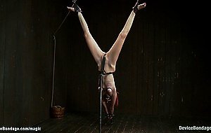 Redhead bound and caned in dark