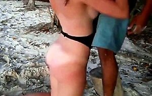 White girl fucks black guy on beach