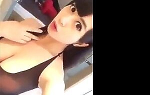 Busty Asian showing off her body