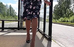 HannaTransa Chastity Crossdresser outdoors at train station.