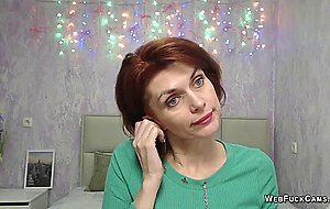Clothed redhead Milf chatting in webcam show