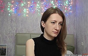 Amateur brunette flashes tit on webcam show