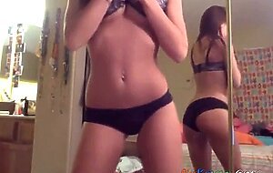 Brunette girl makes a video for her friend.